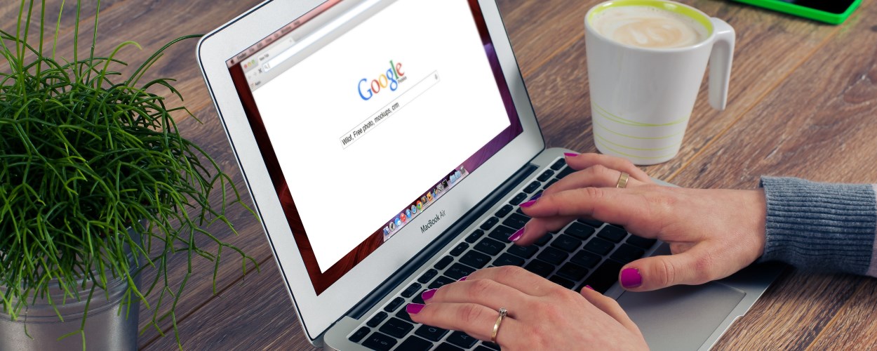 Person searching the web on their laptop