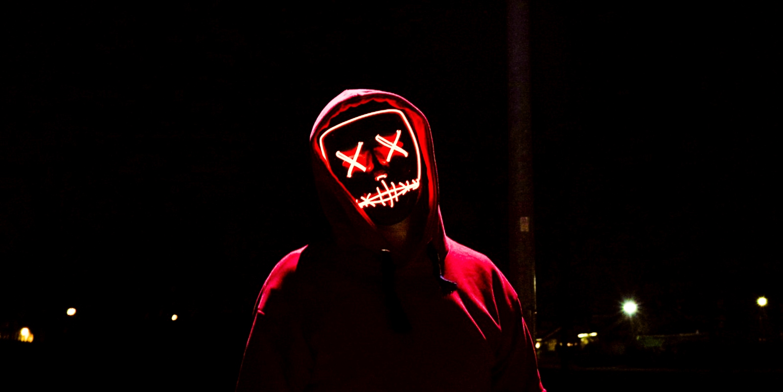 A hacker in a purge outfit