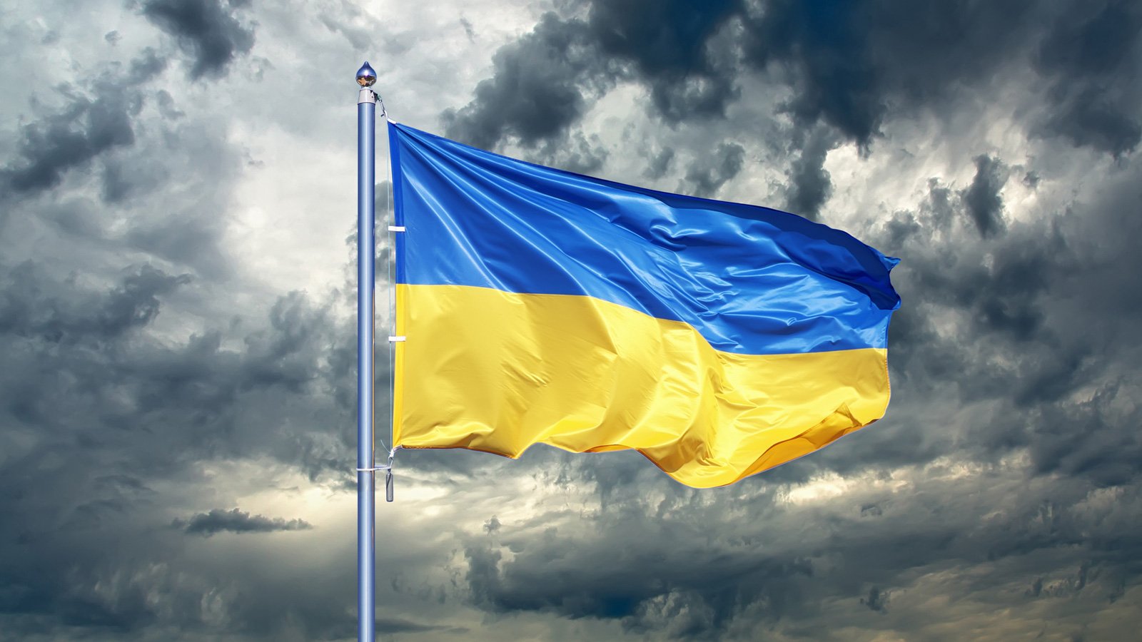 Ukraine flag with incoming storm