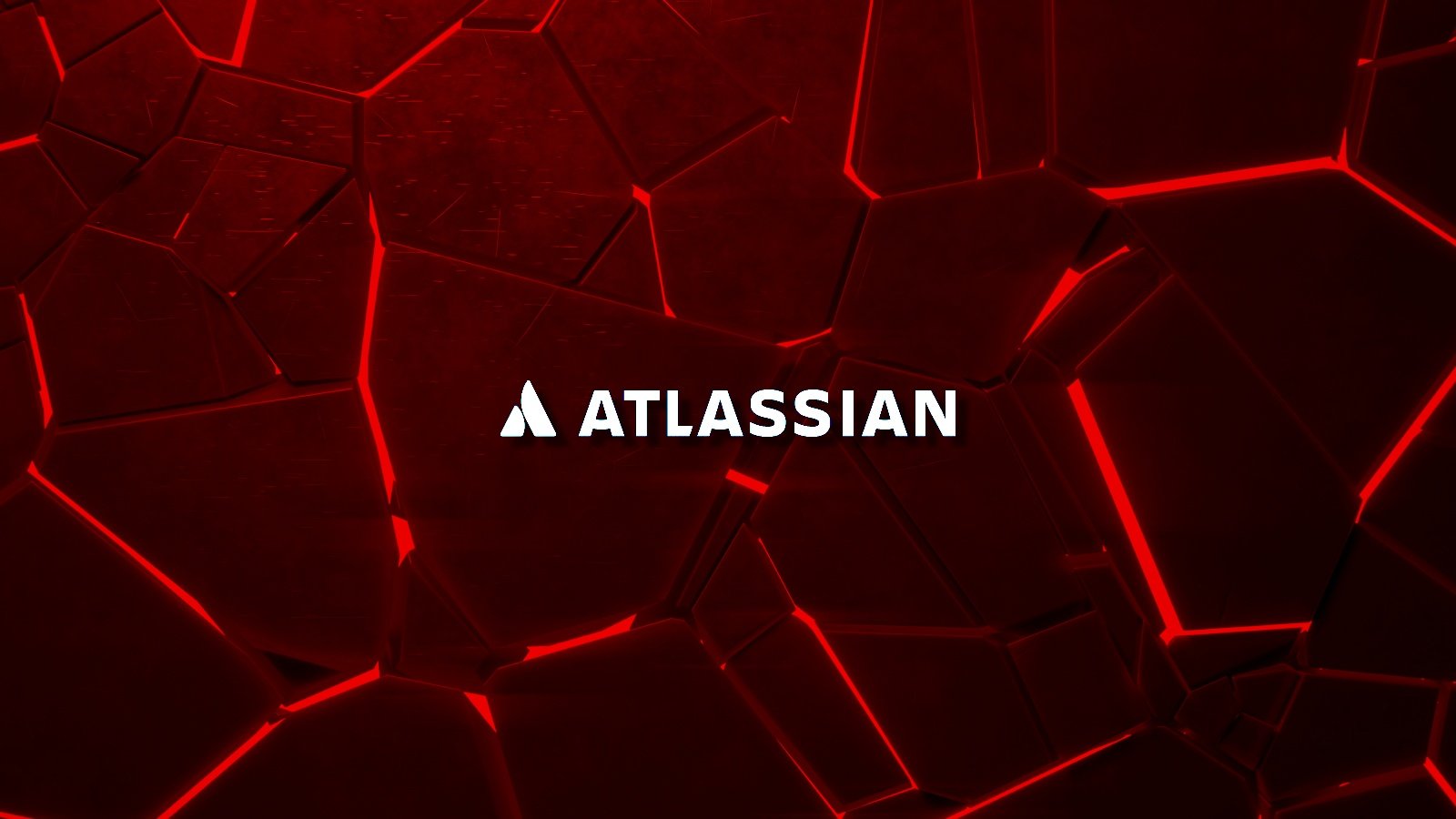 Parçalanan bir kırmızı kaya üzerinde Atlassian metin