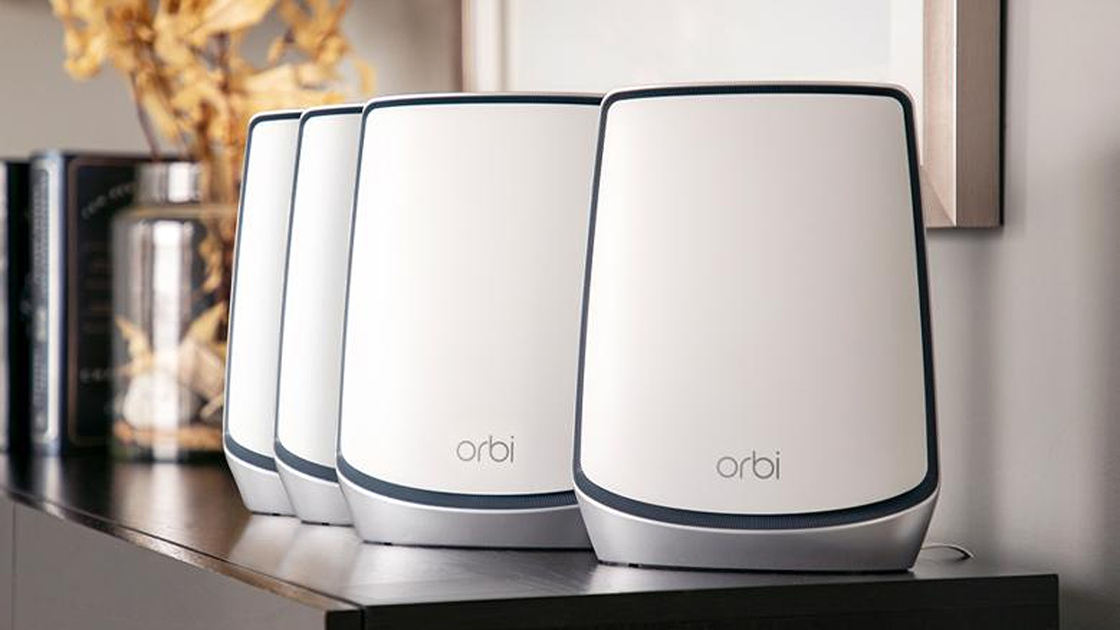 Netgear Orbi Routers on a counter