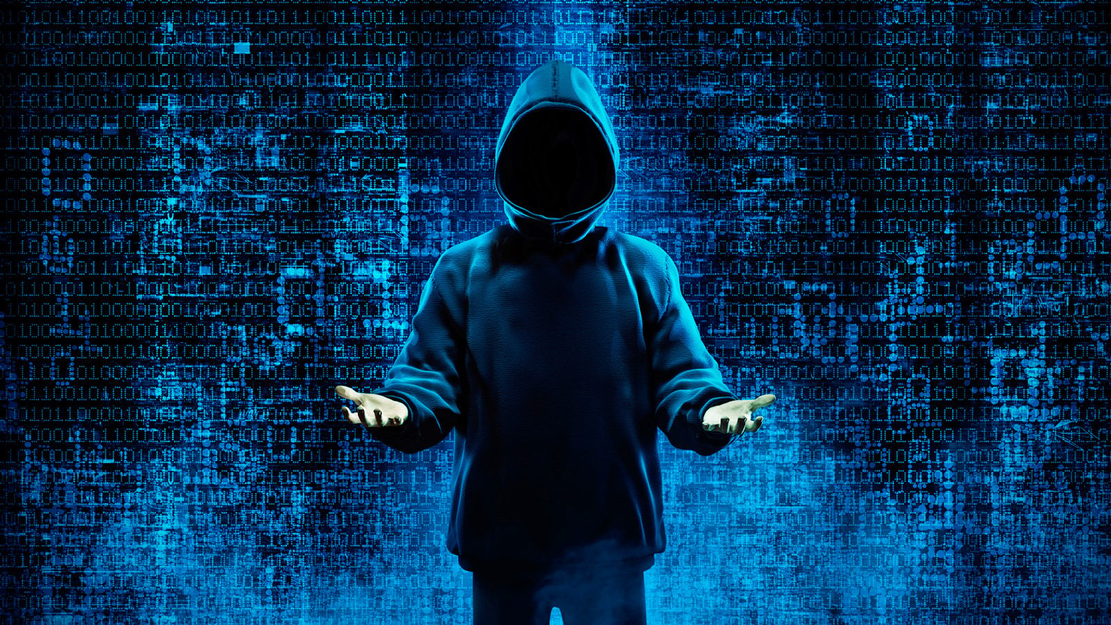 Hacker with arms raised