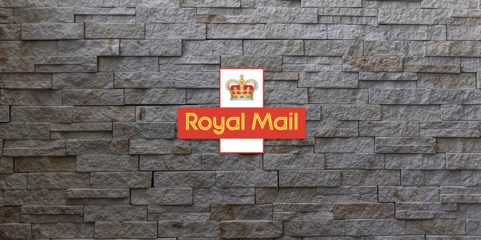 Royal Mail logo on brick wall