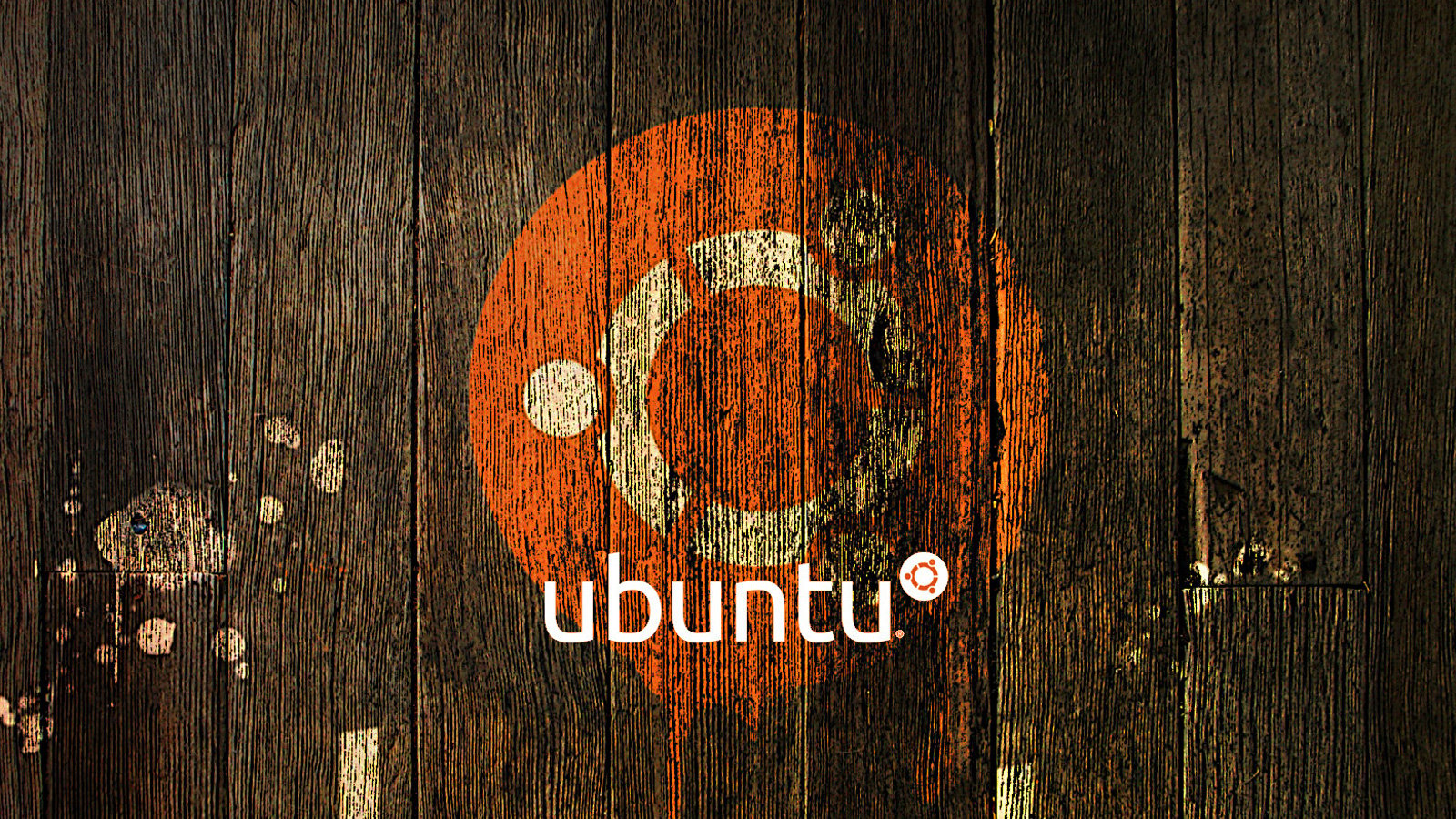 Ubuntu logo dripping from wall