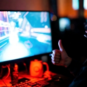 Gamer gaming thumbs up