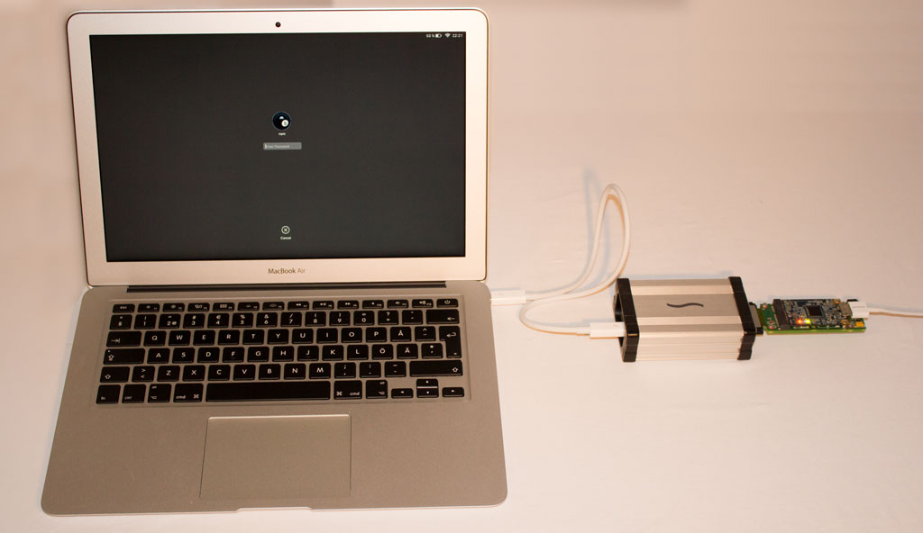 PCILeech device connected to a MacBook Air