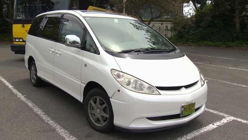 Higgins family Toyota Estima minivan stranded in a Victoria parking lot