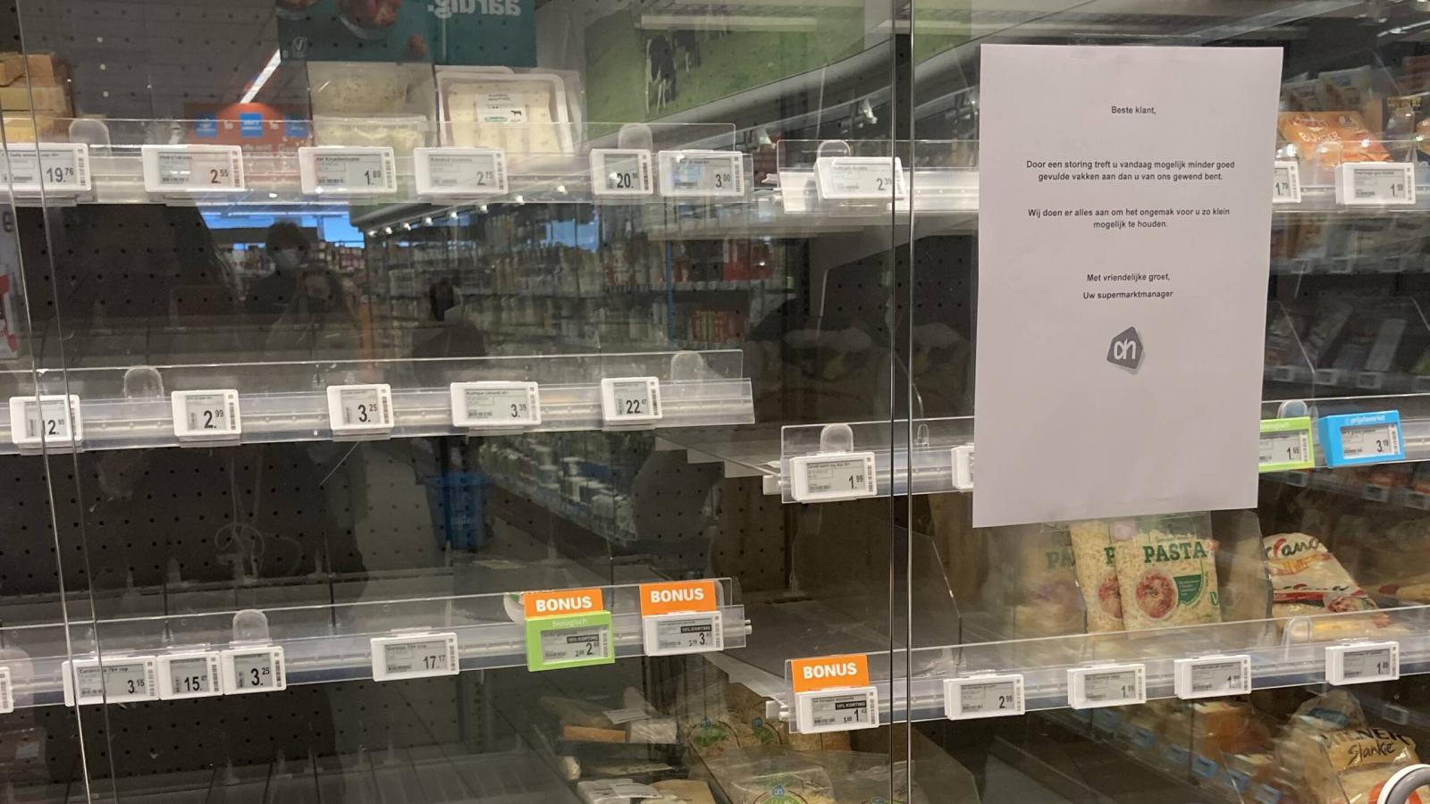 Empty food shelves at Albert Heijn